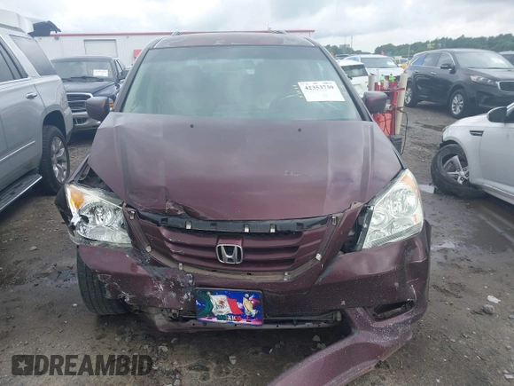 2010 Honda Odyssey EX with VIN 5FNRL3H45AB044845, listed as a IAAI auction lot 42353739 with 289,376 mi miles and . Bid and sale history available at DreamBid. Image 12.