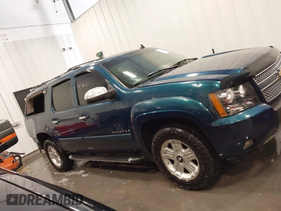 2007 Chevrolet Suburban LTZ with VIN 3GNFK16337G265066, listed as a IAAI auction lot 42373286 with 241,759 mi miles and . Bid and sale history available at DreamBid. Image 14.