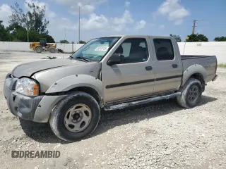 2002 Nissan Frontier SE z VIN 1N6ED27T02C329351, wystawiony jako Copart lot #65810135 z przebiegiem 289 287 mil mil oraz Czysty tytuł • Clean title. Historia ofert i sprzedaży dostępna na DreamBid. Obrazek 1.