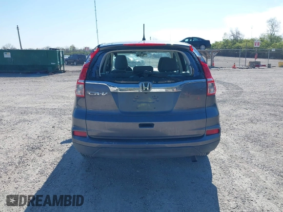 2015 Honda CR-V LX with VIN 2HKRM3H31FH557779, listed as a IAAI auction lot 42098299 with 211,683 mi miles and . Bid and sale history available at carsss.com. Image 16.