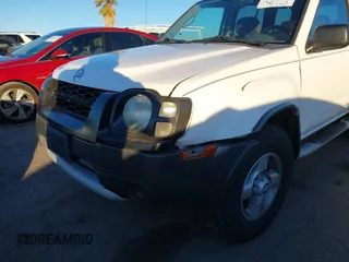 2002 Nissan Xterra XE z VIN 5N1ED28Y12C571994, wystawiony jako IAAI lot #41401574 z przebiegiem 141 383 mil mil oraz . Historia ofert i sprzedaży dostępna na DreamBid. Obrazek 6.