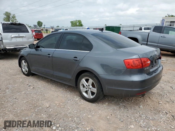 2014 Volkswagen Jetta TDI w/Premium with VIN 3VWLL7AJ7EM313598, listed as a Copart auction lot 54905595 with 162,036 mi miles and Salvage title. Bid and sale history available at DreamBid. Image 2.
