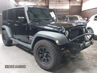 2015 Jeep Wrangler Unlimited Willys Wheeler with VIN 1C4BJWDG1FL749803, listed as a IAAI auction lot 41995132 with 156,595 mi miles and . Bid and sale history available at DreamBid. Image 1.