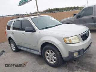 2008 Mazda Tribute Touring with VIN 4F2CZ961X8KM18007, listed as a IAAI auction lot 42035010 with 216,270 mi miles. Bid and sale history available at carsss.com. Image 1.
