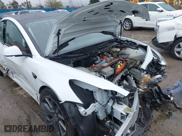 2023 Tesla Model 3 with VIN 5YJ3E1EA6PF432397, listed as a IAAI auction lot 41760895 with 15,692 mi miles and . Bid and sale history available at DreamBid. Image 21.