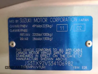2003 Suzuki XL7 Touring z VIN JS3TX92V534106982, wystawiony jako Copart lot #85931744 z przebiegiem 307 709 mil mil oraz Szkoda całkowita • Salvage title. Historia ofert i sprzedaży dostępna na DreamBid. Obrazek 14.