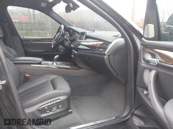 2017 BMW X5 xDrive35i with VIN 5UXKR0C51H0U50014, listed as a IAAI auction lot 41727826 with 76,069 mi miles. Bid and sale history available at carsss.com. Image 5.