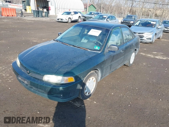 2001 Mitsubishi Mirage ES z VIN JA3AY26C91U041410, wystawiony jako IAAI lot #41360183 z przebiegiem 322 178 mil mil oraz . Historia ofert i sprzedaży dostępna na DreamBid. Obrazek 2.