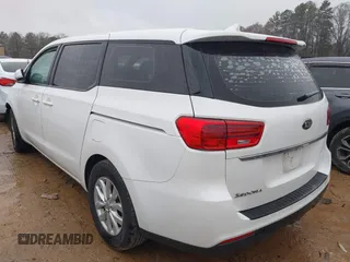 2020 Kia Sedona L with VIN KNDMA5C17L6595852, listed as a IAAI auction lot 41566584 with 102,712 mi miles. Bid and sale history available at carsss.com. Image 3.