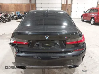 2021 BMW 3 Series M340i xDrive z VIN 3MW5U9J09M8B91584, wystawiony jako IAAI lot #42203384 z przebiegiem 42 688 mil mil oraz . Historia ofert i sprzedaży dostępna na DreamBid. Obrazek 16.
