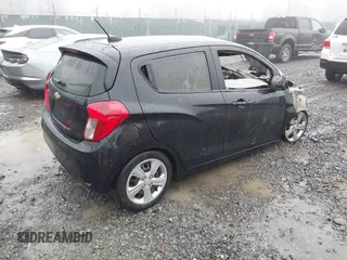 2022 Chevrolet Spark LS with VIN KL8CB6SA4NC027989, listed as a IAAI auction lot 41945366 with 49,881 mi miles and . Bid and sale history available at DreamBid. Image 4.