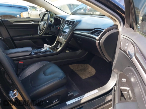 2017 Ford Fusion Titanium with VIN 3FA6P0SU0HR277268, listed as a IAAI auction lot 41798990 with 140,452 mi miles and . Bid and sale history available at DreamBid. Image 5.