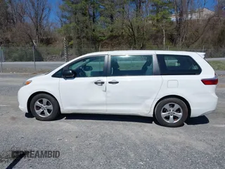 2015 Toyota Sienna L with VIN 5TDZK3DC3FS690484, listed as a IAAI auction lot 41888073 with 201,518 mi miles and . Bid and sale history available at carsss.com. Image 14.