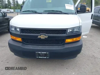 2019 Chevrolet Express Cargo z VIN 1GCWGAFP7K1189100, wystawiony jako IAAI lot #42459577 z przebiegiem 95 789 mil mil oraz . Historia ofert i sprzedaży dostępna na DreamBid. Obrazek 6.