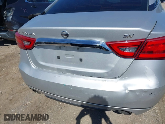 2016 Nissan Maxima Platinum with VIN 1N4AA6AP1GC400986, listed as a IAAI auction lot 41603612 with 171,784 mi miles and . Bid and sale history available at DreamBid. Image 6.