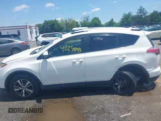 2016 Toyota RAV4 XLE with VIN JTMRFREV0GJ073114, listed as a IAAI auction lot 42548094 with 119,431 mi miles and . Bid and sale history available at DreamBid. Image 14.