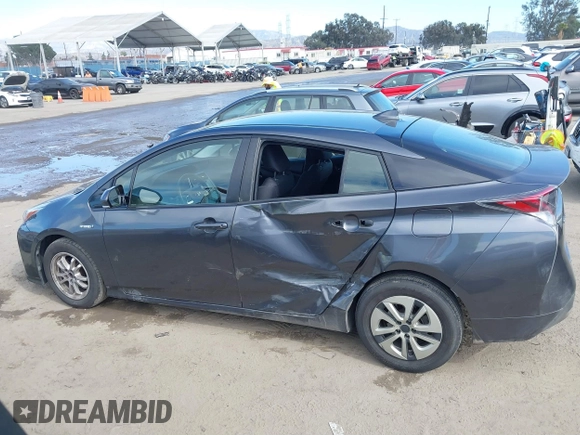 2016 Toyota Prius Four z VIN JTDKARFU2G3022031, wystawiony jako IAAI lot #41631802 z przebiegiem 151 389 mil mil oraz . Historia ofert i sprzedaży dostępna na DreamBid. Obrazek 14.