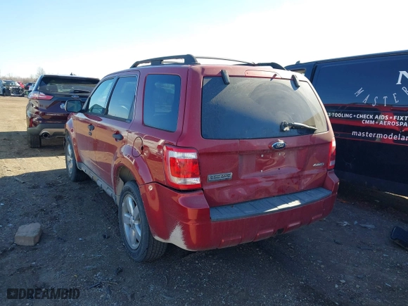 2009 Ford Escape XLT with VIN 1FMCU93G09KB76882, listed as a IAAI auction lot 41810579 with 167,584 mi miles. Bid and sale history available at carsss.com. Image 3.
