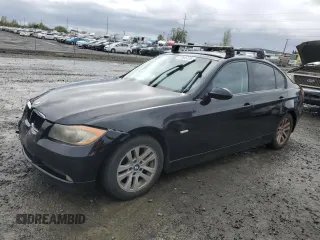 2007 BMW 3 Series 328i with VIN WBAVA37567NL14137, listed as a Copart auction lot 52636125 with 145,391 mi miles and Salvage title. Bid and sale history available at DreamBid. Image 1.