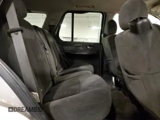 2007 GMC Envoy SLE z VIN 1GKDT13S172300399, wystawiony jako Copart lot #56978495 z przebiegiem 239 862 mil mil oraz Nie do naprawy. Historia ofert i sprzedaży dostępna na DreamBid. Obrazek 11.