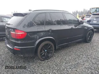 2010 BMW X5 M with VIN 5YMGY0C59ALK25572, listed as a IAAI auction lot 41712140 with 163,226 mi miles. Bid and sale history available at carsss.com. Image 4.