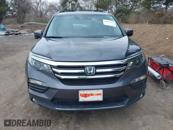 2017 Honda Pilot Touring with VIN 5FNYF6H92HB012090, listed as a IAAI auction lot 41882542 with 110,179 mi miles and . Bid and sale history available at DreamBid. Image 12.