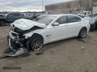 2012 BMW 7 Series 750i xDrive with VIN WBAKC6C52CC396698, listed as a Copart auction lot 85647074 with 57,066 mi miles and Salvage Title. Bid and sale history available at carsss.com. Image 1.