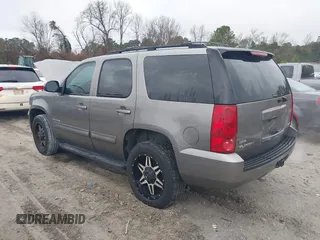 2007 GMC Yukon SLT with VIN 1GKFK13047R288220, listed as a IAAI auction lot 41579399 with 215,464 mi miles. Bid and sale history available at carsss.com. Image 3.