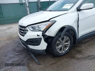 2014 Hyundai Santa Fe z VIN 5XYZTDLB5EG147354, wystawiony jako IAAI lot #42235940 z przebiegiem 107 466 mil mil oraz . Historia ofert i sprzedaży dostępna na DreamBid. Obrazek 6.