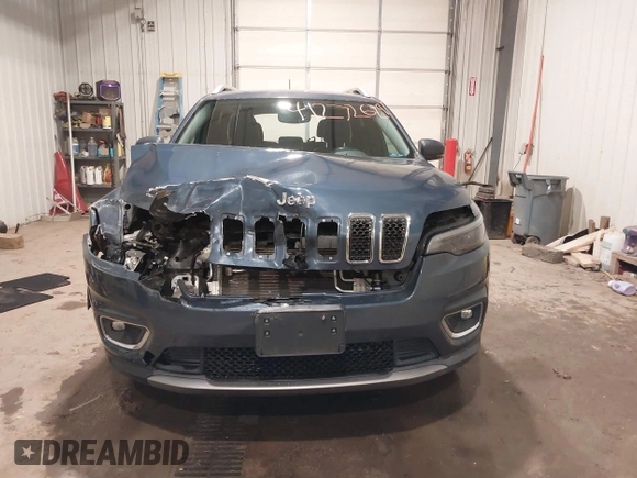 2020 Jeep Cherokee Limited with VIN 1C4PJMDX2LD516951, listed as a IAAI auction lot 41272629 with 99,717 mi miles and . Bid and sale history available at DreamBid. Image 12.