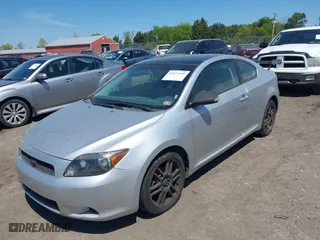 2006 Scion tC with VIN JTKDE177060139123, listed as a IAAI auction lot 42075140 with 218,391 mi miles. Bid and sale history available at carsss.com. Image 2.