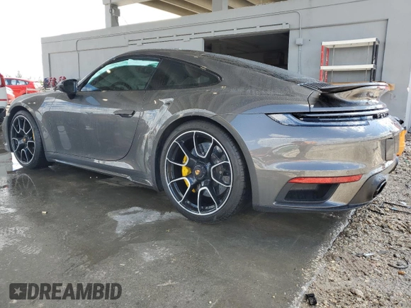 2022 Porsche 911 Turbo S z VIN WP0AD2A91NS255589, wystawiony jako Copart lot #60695644 z przebiegiem 6 562 mil mil oraz Nie do naprawy • Non repairable. Historia ofert i sprzedaży dostępna na DreamBid. Obrazek 2.