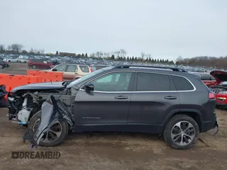 2022 Jeep Cherokee Limited with VIN 1C4PJMDX2ND501286, listed as a IAAI auction lot 41196619 with 54,975 mi miles and . Bid and sale history available at DreamBid. Image 14.