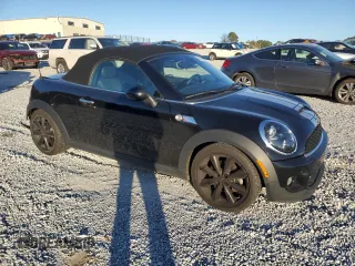 2012 MINI Roadster S z VIN WMWSY3C51CT565240, wystawiony jako Copart lot #83651954 z przebiegiem 172 954 mil mil oraz Szkody całkowita. Historia ofert i sprzedaży dostępna na DreamBid. Obrazek 4.