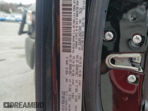 2019 Ram 2500 Laramie with VIN 3C6UR5FJ0KG713491, listed as a Copart auction lot 47077735 with 52,051 mi miles and Salvage Title. Bid and sale history available at carsss.com. Image 12.