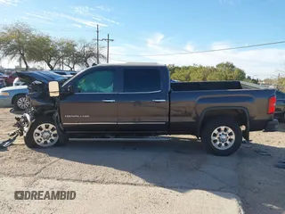 2015 GMC Sierra 2500HD available WiFi Denali with VIN 1GT120E81FF147611, listed as a IAAI auction lot 41536669 with 1 mi miles. Bid and sale history available at carsss.com. Image 14.