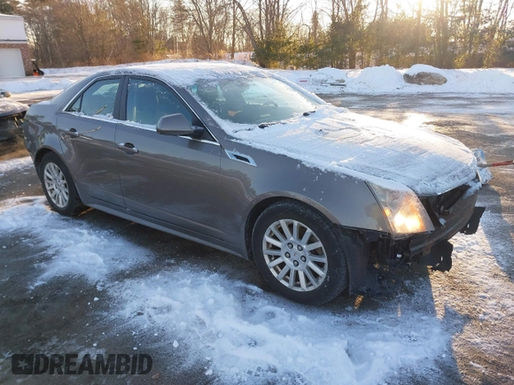 2012 Cadillac CTS Luxury with VIN 1G6DH5E53C0135315, listed as a IAAI auction lot 41272590 with 105,419 mi miles and . Bid and sale history available at DreamBid. Image 1.