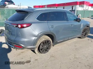 2021 Mazda CX-9 Grand Touring with VIN JM3TCBDY2M0530533, listed as a IAAI auction lot 41309425 with 84,747 mi miles. Bid and sale history available at carsss.com. Image 4.