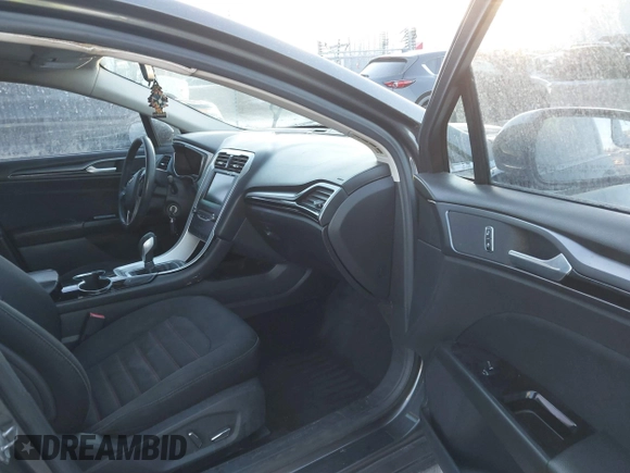 2015 Ford Fusion SE Hybrid with VIN 3FA6P0LU1FR219908, listed as a IAAI auction lot 41272688 with 310,452 mi miles. Bid and sale history available at carsss.com. Image 5.