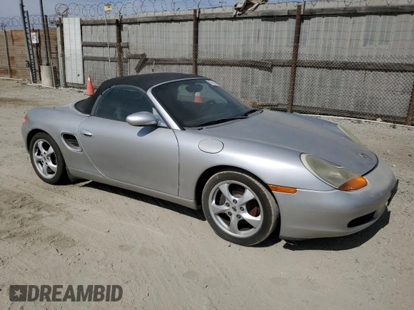 2002 Porsche Boxster z VIN WP0CA298X2U622776, wystawiony jako Copart lot #57521485 z przebiegiem 111 257 mil mil oraz Czysty tytuł • Clean title. Historia ofert i sprzedaży dostępna na DreamBid. Obrazek 4.
