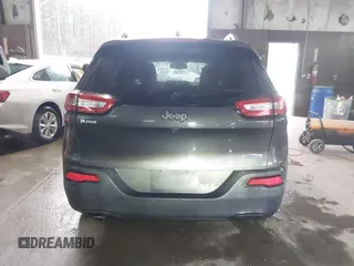 2016 Jeep Cherokee Latitude with VIN 1C4PJLCB1GW206686, listed as a IAAI auction lot 41568397 with 165,980 mi miles. Bid and sale history available at carsss.com. Image 16.