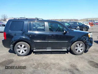 2014 Honda Pilot Touring with VIN 5FNYF4H94EB049495, listed as a IAAI auction lot 41937134 with 149,445 mi miles and . Bid and sale history available at carsss.com. Image 13.