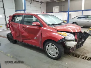 2008 Scion xD with VIN JTKKU10428J000697, listed as a Copart auction lot 51868885 with 153,996 mi miles and Salvage Title. Bid and sale history available at carsss.com. Image 4.
