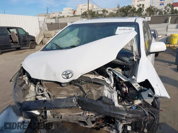 2014 Toyota Sienna SE with VIN 5TDXK3DC2ES472249, listed as a IAAI auction lot 41402101 with Not Provided miles and . Bid and sale history available at DreamBid. Image 11.