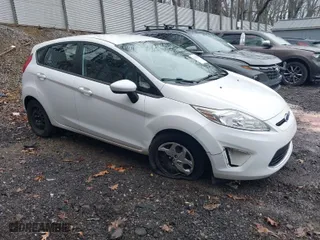 2012 Ford Fiesta SE with VIN 3FADP4EJ3CM150259, listed as a IAAI auction lot 41964770 with 100,343 mi miles. Bid and sale history available at carsss.com. Image 1.