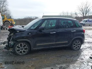2014 FIAT 500L Trekking with VIN ZFBCFADH2EZ007992, listed as a IAAI auction lot 41660545 with 177,863 mi miles and . Bid and sale history available at DreamBid. Image 14.
