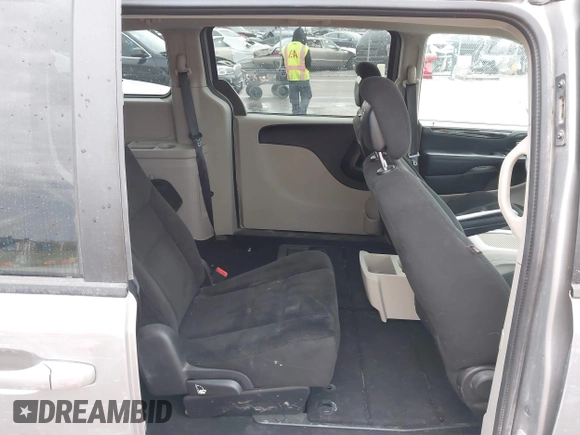 2016 Dodge Grand Caravan SXT with VIN 2C4RDGCG3GR321933, listed as a IAAI auction lot 41895209 with 186,502 mi miles and . Bid and sale history available at DreamBid. Image 8.