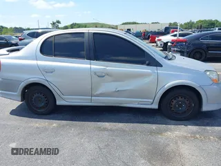 2003 Toyota ECHO with VIN JTDBT123935047533, listed as a IAAI auction lot 42143695 with 170,911 mi miles. Bid and sale history available at carsss.com. Image 6.