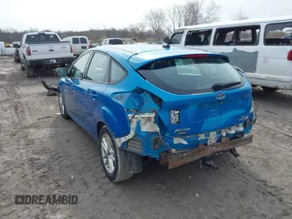 2015 Ford Focus SE with VIN 1FADP3K20FL383433, listed as a IAAI auction lot 42018563 with 101,789 mi miles. Bid and sale history available at carsss.com. Image 3.