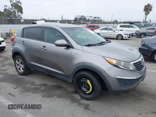 2013 Kia Sportage LX with VIN KNDPBCA23D7529658, listed as a IAAI auction lot 42473877 with 114,797 mi miles and . Bid and sale history available at DreamBid. Image 1.